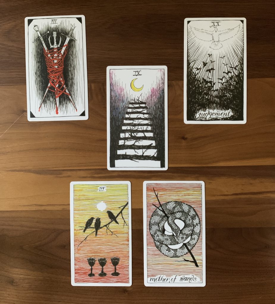 The work week ahead spread, using the Wild Unknown deck and showing the Three of swords, Judgement, the Nine of wands, the Three of cups, and the Queen of wands. 